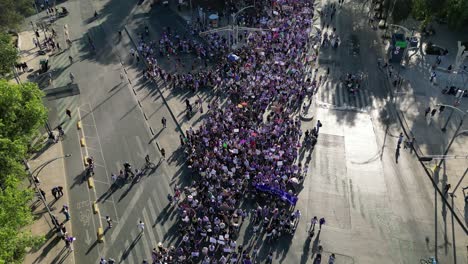 aerial view march 8th women's day march, on paseo de la reforma, mexico city, international women's day