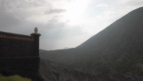 pura luhur poten hindu temple beside the misty volcanic terrain of mount batok, east java, indonesia