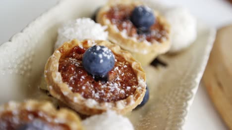 Close-up-of-tart-arranged-on-serving-tray