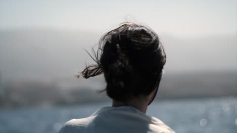 slow motion contemplation on a boat, girl engrossed in view