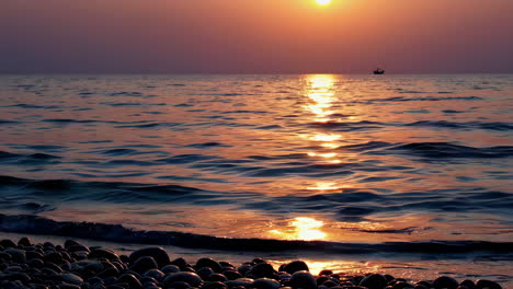 sunset over the sea with reflections on the water