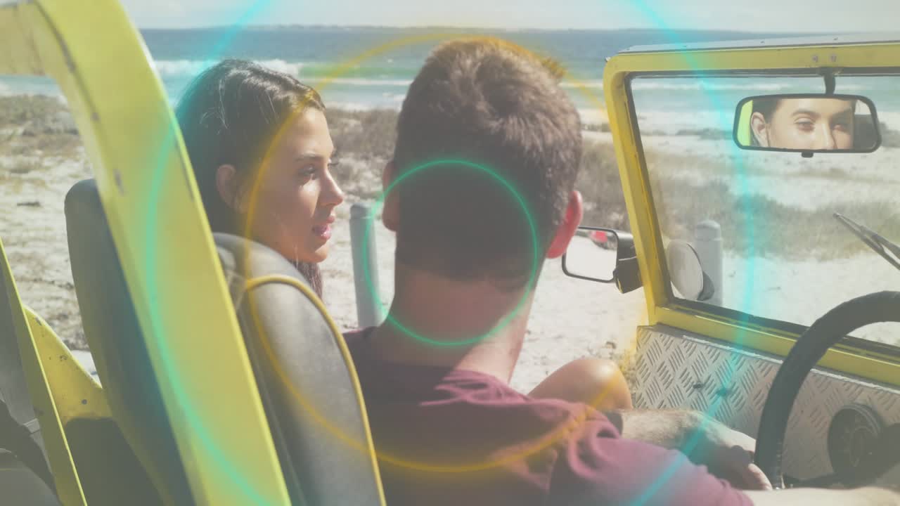 Woman rider speaking to driver in yellow jeep, planning travel as color rings sweeping over couple