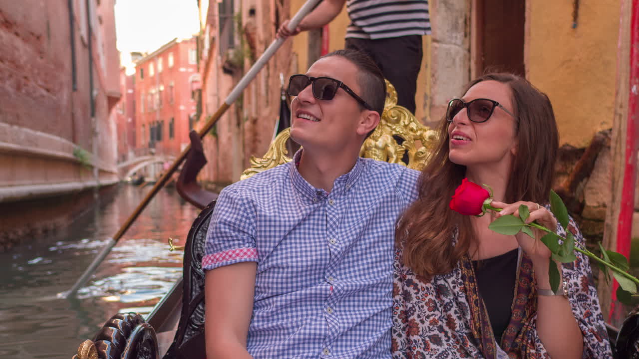 Couple enjoying a gondola ride in Venice