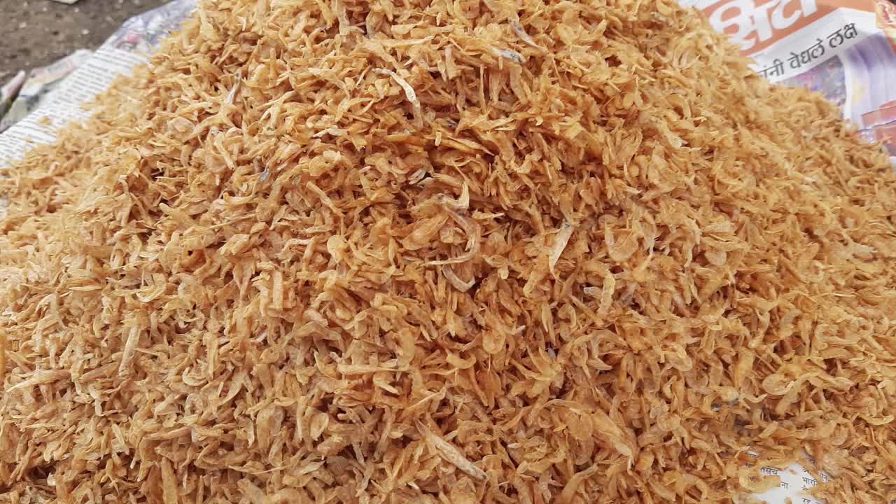 Dry Fish dried shrimp or dry kardi fish or dried prawns are arranged in the market for selling