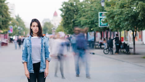 woman standing in city street