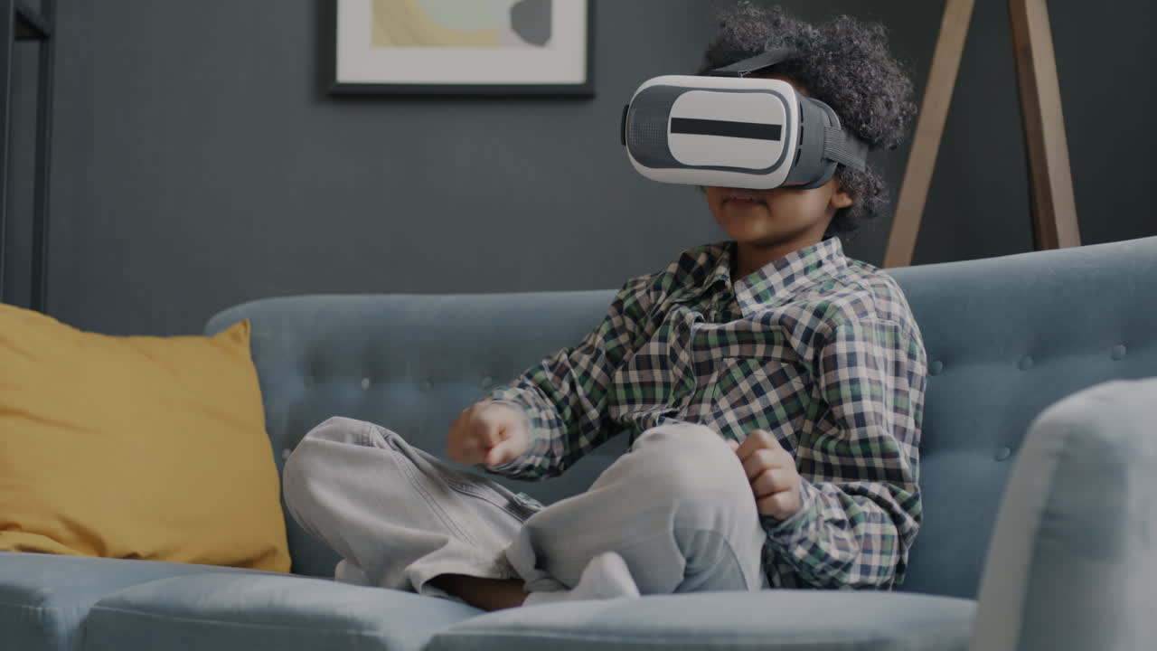 Child Wearing VR Headset on a Couch