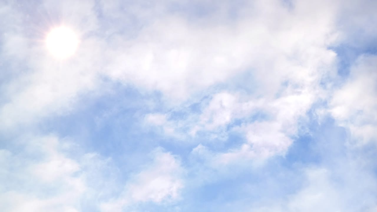 흰 구름 뒤에 빛나는 태양 푸른 하늘