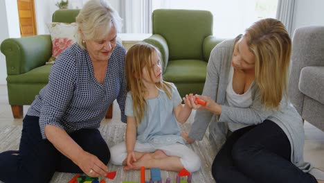 family playing with toys in living room 4k