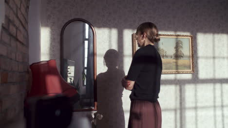 woman in a sunlit room