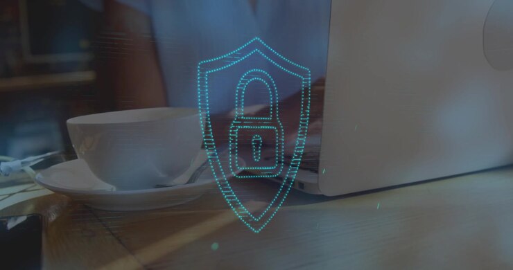 Animation of lens flares and padlock in shield over midsection of businesswoman using laptop