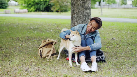 woman and dog in park