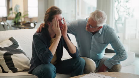 father consoling his son