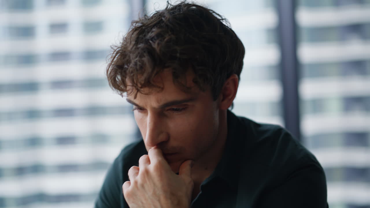 IT specialist hands typing laptop keyboard at modern corporate space closeup
