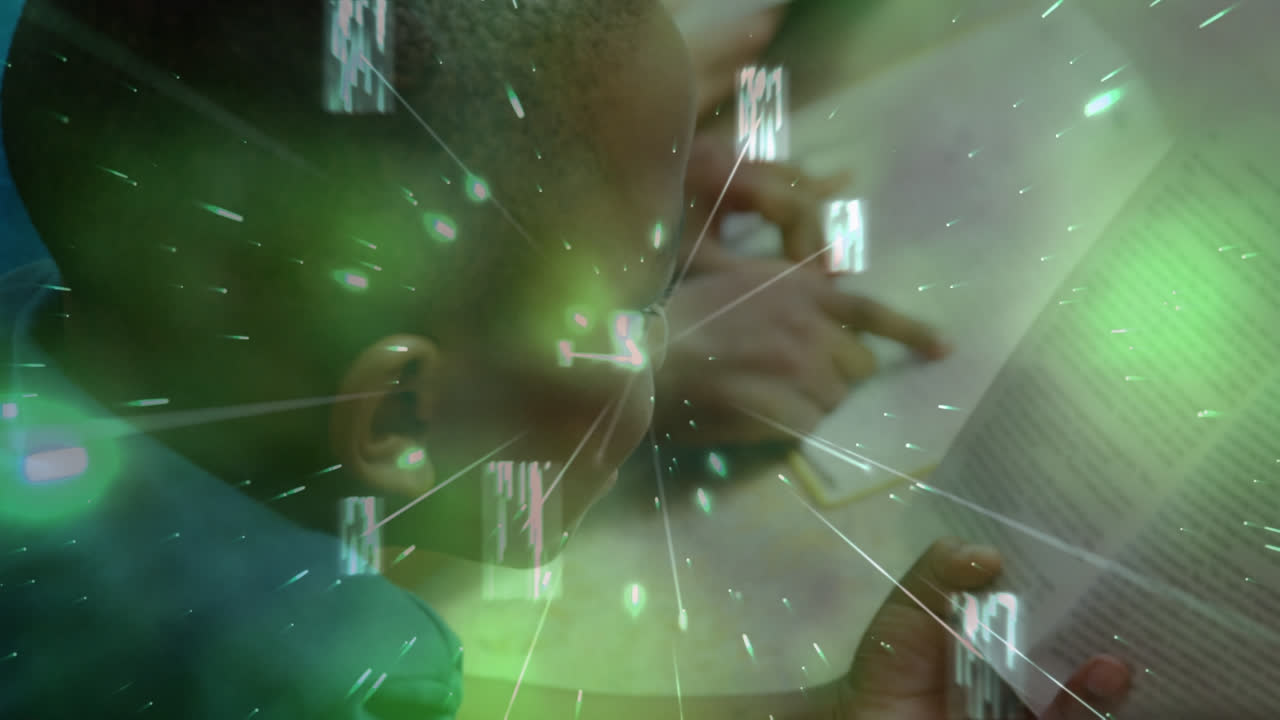 Glowing green particles floating against group of diverse students studying in the class at school