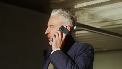 mature man on phone