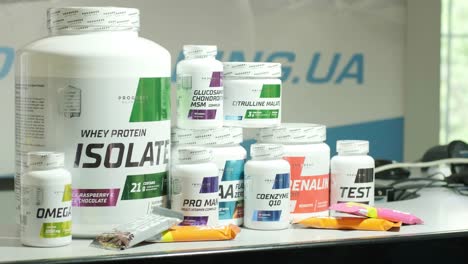 sport nutrition store interior with large choice of nutritional supplements.