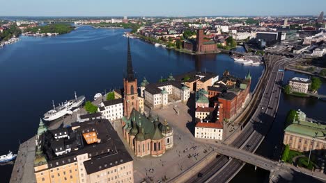 Riddarholmen-Islet-Crane-Down-Shot---Beautiful-Day-in-Stockholm,-Sweden