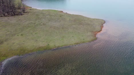 low altitude drone flight over lake plastira in greece | 4k