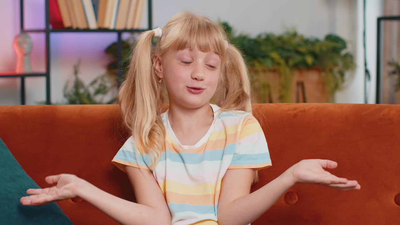 Confused preteen school girl feeling embarrassed about ambiguous question, having doubts, no idea