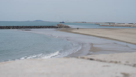 beach in winter sete mediterranean sea france concrete jetty