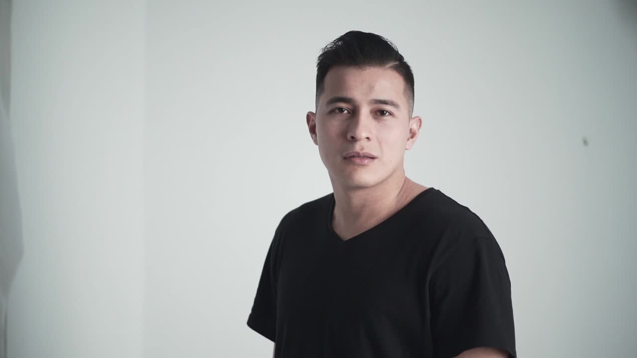 Man in black v-neck t-shirt