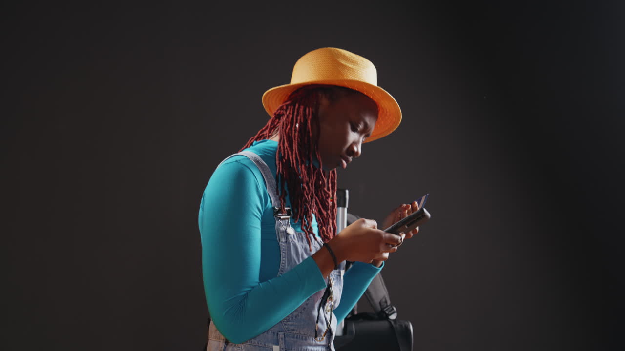 Cheerful traveller doing online shopping