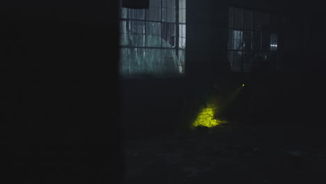 a wounded soldier in the abandoned military complex