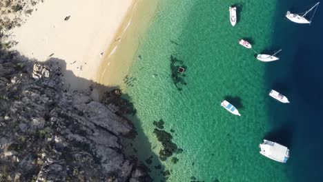 top view of boats in the crystal green waters of el balconcito beach