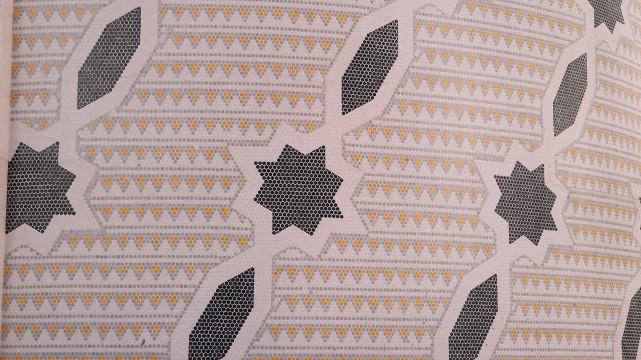 intricate detailed islamic artwork design on a minaret at Jame' Asr Hassanil Bolkiah Mosque in Bandar Seri Bagawan in Brunei Darussalam