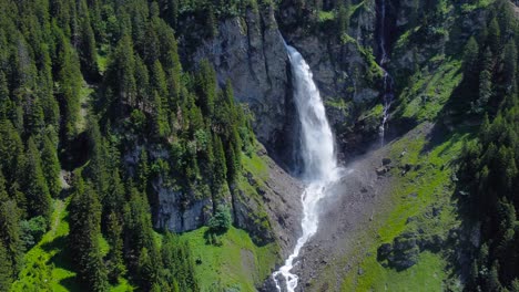 drone bird’s eye view above staubifall waterfall and cascading white mist