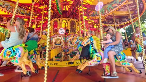 families enjoying a vibrant carousel experience