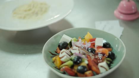 greek salad and carbonara pasta