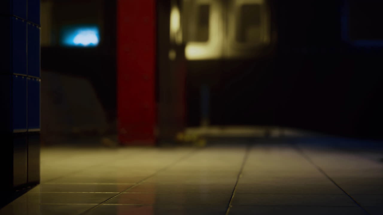 Quiet urban alleyway at night with rays of light illuminating tiles