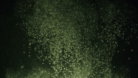 a big cloud of white powder falling trough water in slow motion.