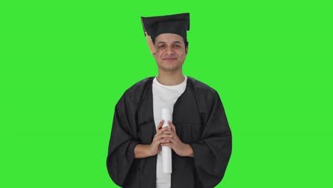 Happy-Indian-college-student-doing-Namaste-Green-screen