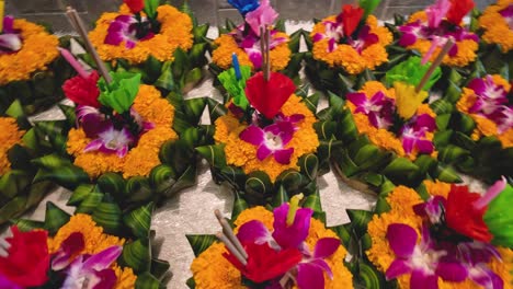 assorted flowers arranged for sale or exhibition.