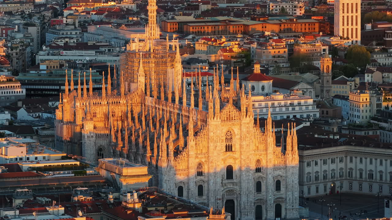 Aerial drone view of the Metropolitan Cathedral-Basilica of the Nativity of Saint Mary on a sunny day, Milan Italy