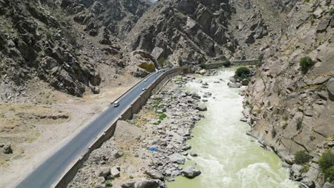 river, road, and mountain in a single frame