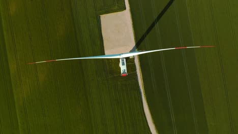 wind turbines and agricultural fields on a summer day - loop