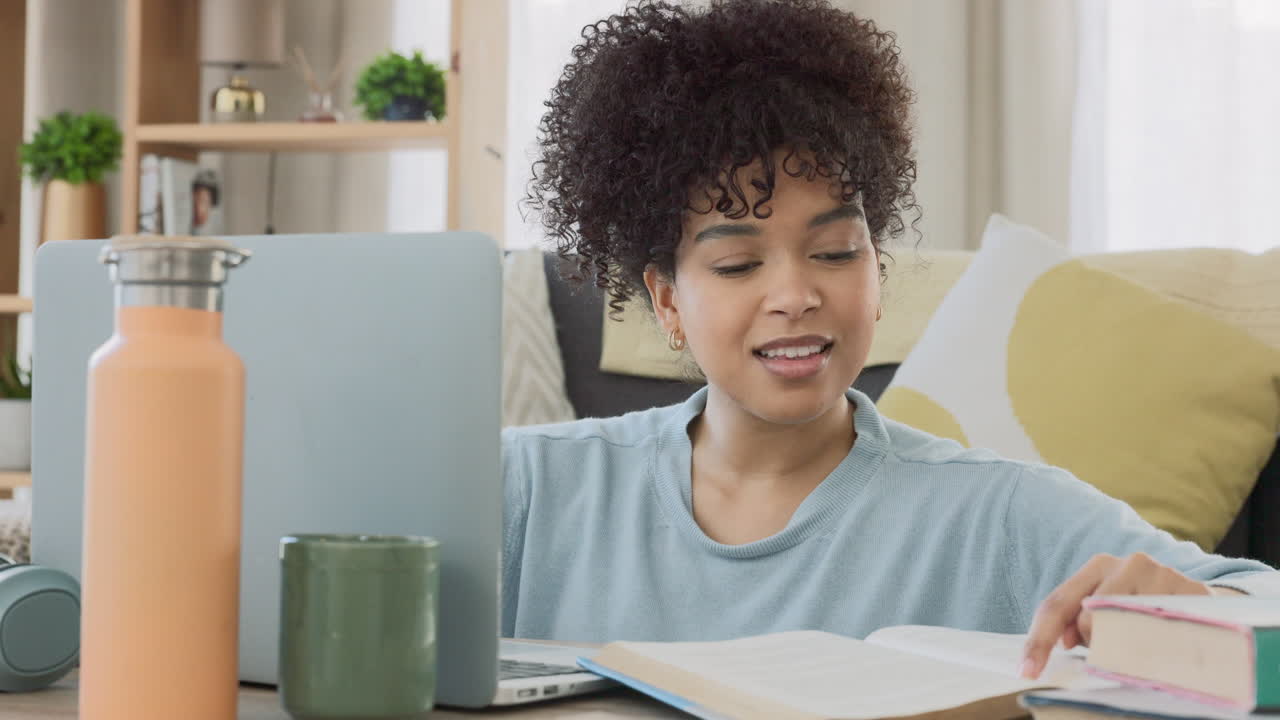 Young female student doing an online assignment