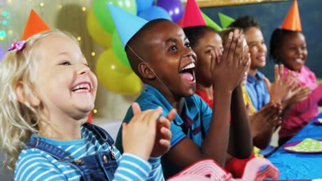 kids clapping their hands during birthday party 4k