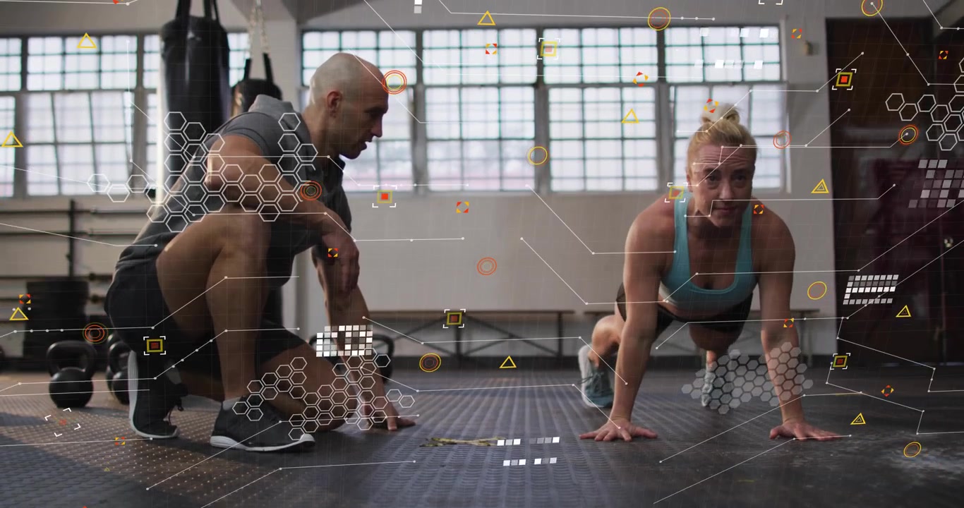 Trainer offering cues and client performing gym pushups by heavy bag with hex grids analyzing form
