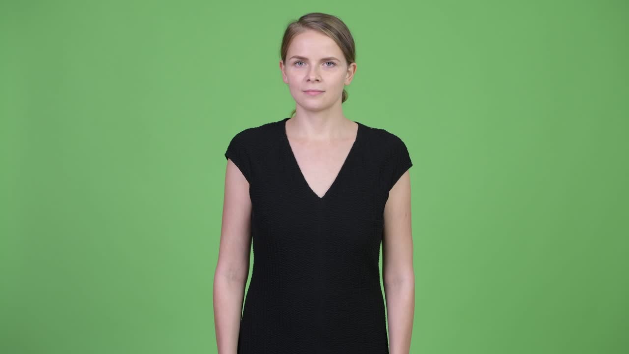 Young beautiful blonde businesswoman with hair tied