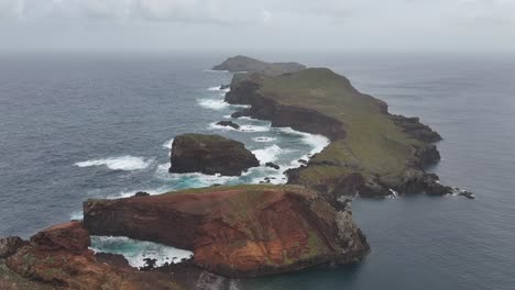 discover the rugged beauty of ponta do surado, madeira, with this breathtaking aerial footage. explore the dramatic cliffs, wild coastline, and pristine landscapes of this unique part of the island