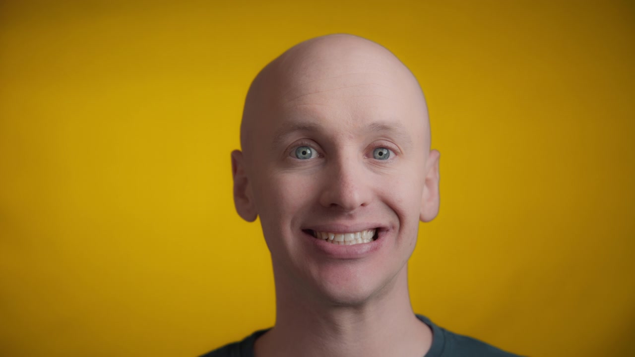 Man making an awkward smile