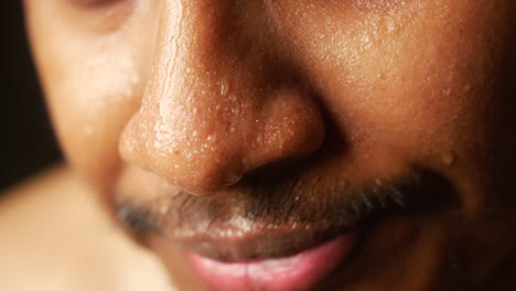 close-up of a man's sweaty face