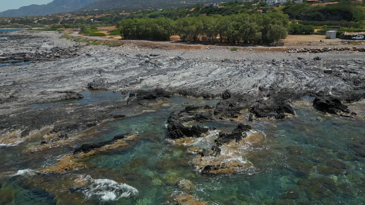 Calm Waves Over Coastal Rocks Of Balos Beach In Crete Island, Greece. Aerial Shot