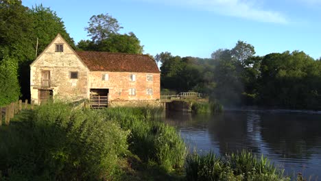 sturminster newton mill, dorset, england, early morning, pan of mill and river stour