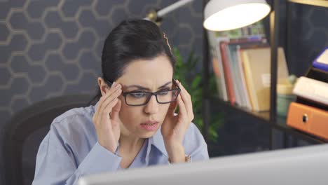 Beautiful-Female-Office-Worker-working-alone.