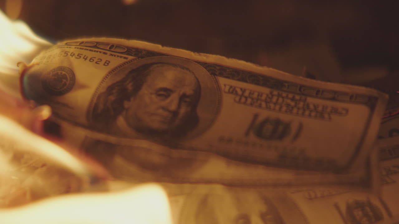 Burning One Hundred Dollar Bills